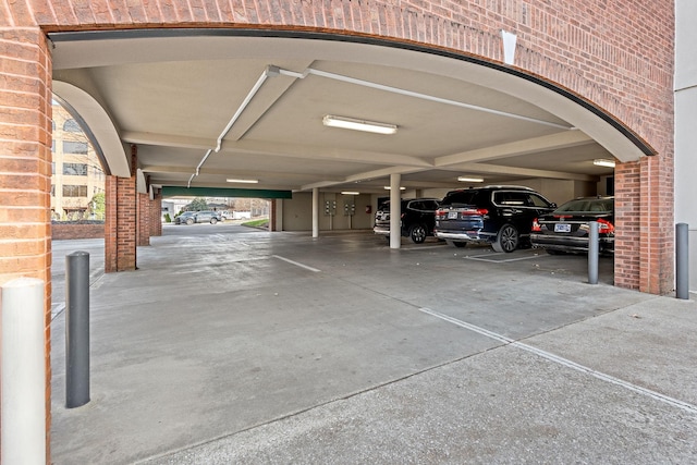 garage featuring a carport