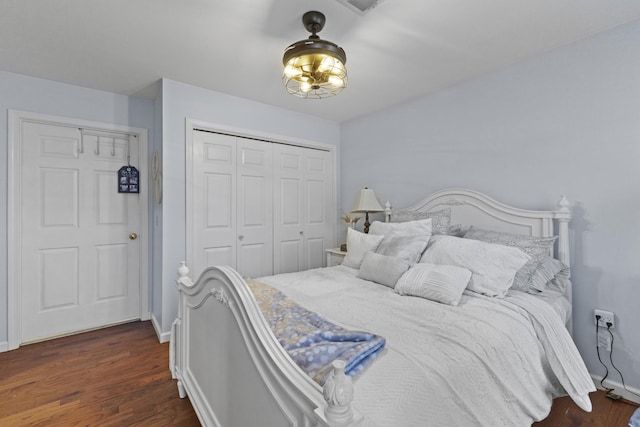 bedroom featuring dark hardwood / wood-style flooring