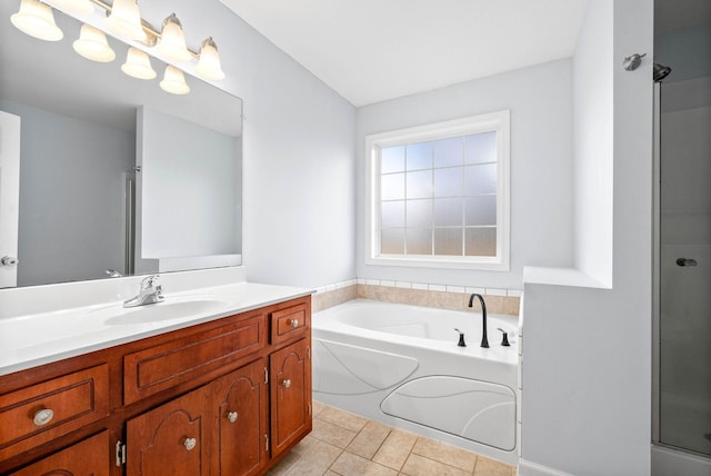 bathroom featuring vanity, independent shower and bath, and tile patterned flooring