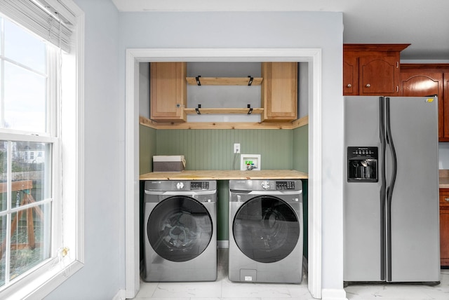 laundry room with washer and clothes dryer