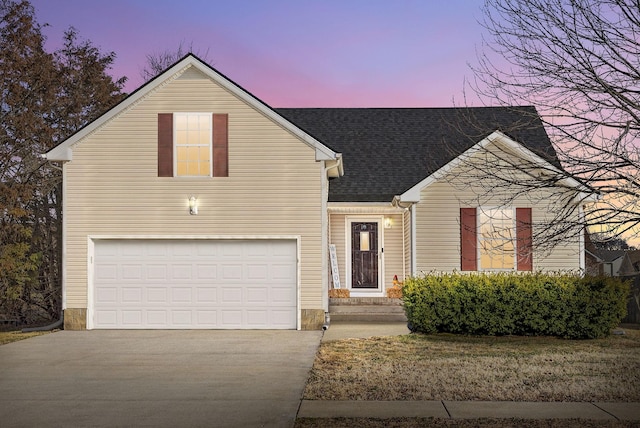 view of front of property featuring a garage