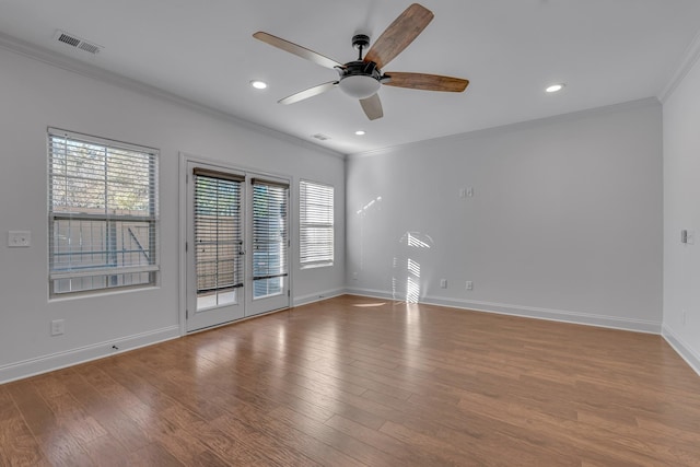 unfurnished room with light hardwood / wood-style flooring, ceiling fan, and ornamental molding