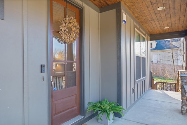 doorway to property featuring covered porch