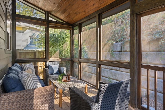 sunroom with wooden ceiling and lofted ceiling