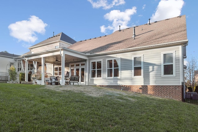 back of house featuring ceiling fan, a patio area, an outdoor hangout area, and a yard