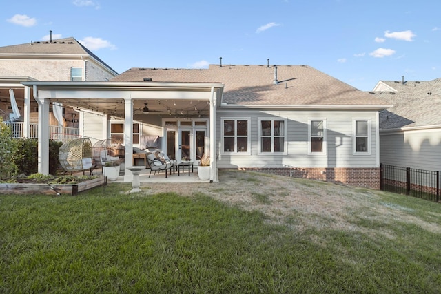 back of house featuring a yard, an outdoor hangout area, ceiling fan, and a patio area