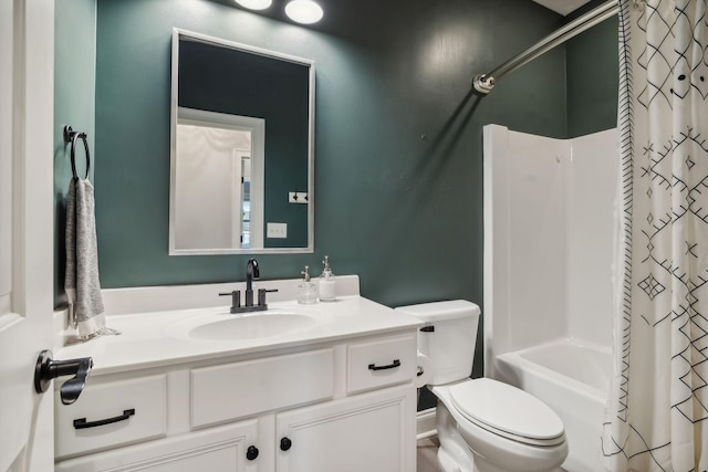 full bathroom with vanity, toilet, and shower / bath combo with shower curtain