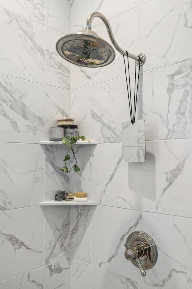 details with a tile shower