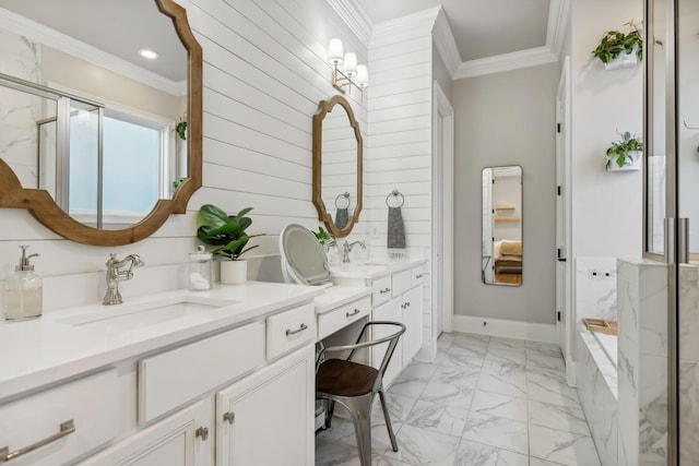 bathroom featuring a tub to relax in, vanity, and ornamental molding