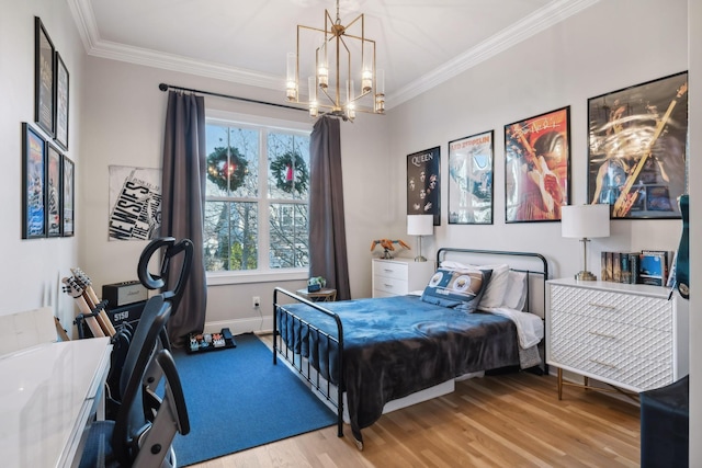 bedroom with ornamental molding, light hardwood / wood-style flooring, and a chandelier