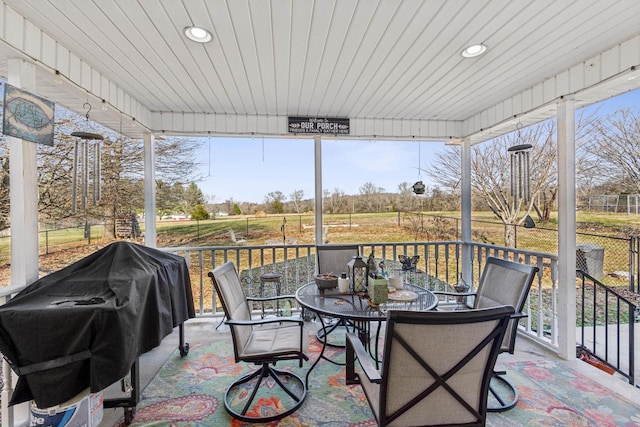 sunroom with wooden ceiling