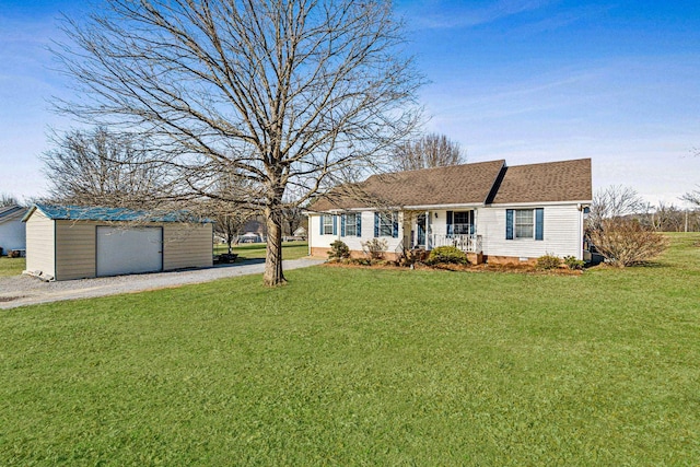 single story home featuring a porch, a garage, an outdoor structure, and a front yard