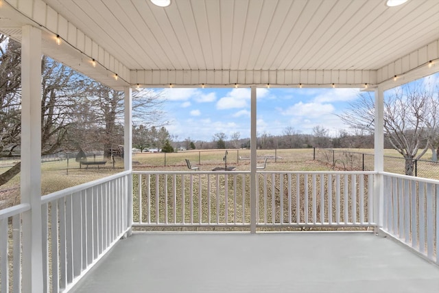 balcony featuring a rural view