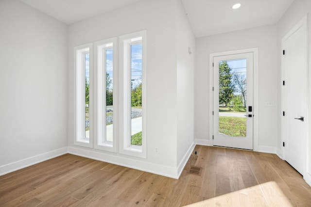 doorway featuring light hardwood / wood-style floors