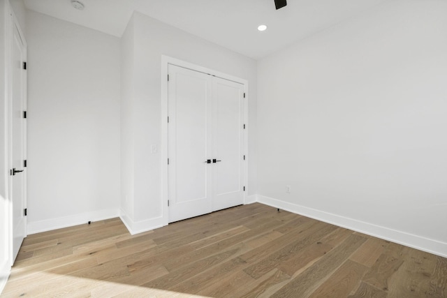 unfurnished room featuring wood-type flooring