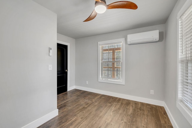 235 Union Ridge Rd, Wartrace, TN 37183 - empty room with baseboards, a wall mounted AC, wood finished floors, and a ceiling fan
