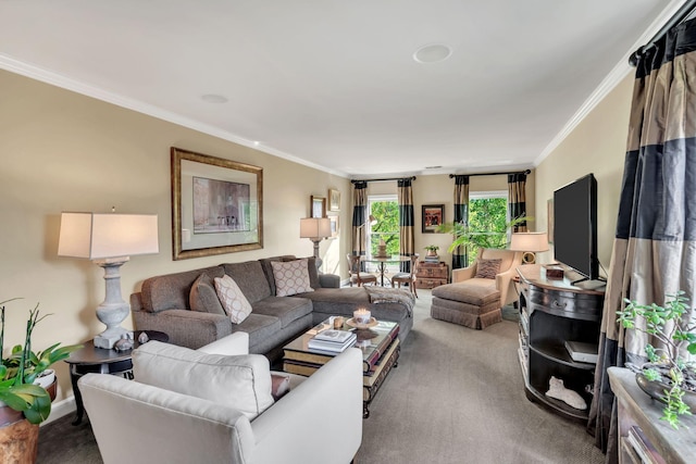 carpeted living room with ornamental molding