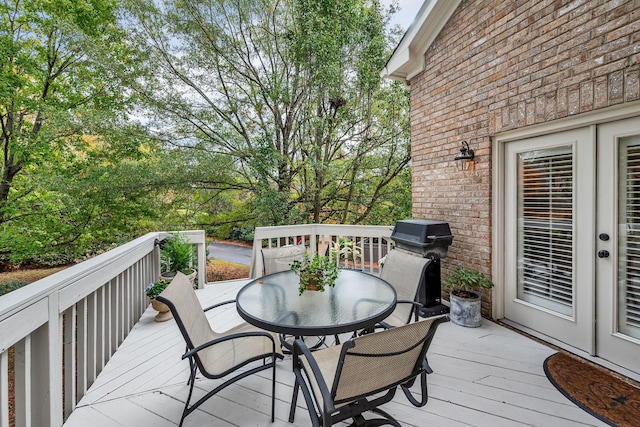 wooden terrace with grilling area