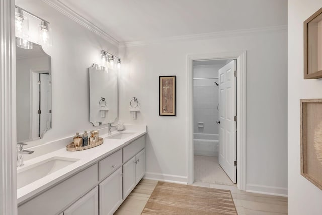 bathroom featuring double vanity, ornamental molding, a sink, and shower / bathing tub combination