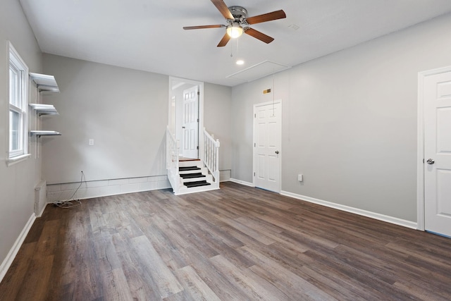 unfurnished living room with hardwood / wood-style flooring and ceiling fan