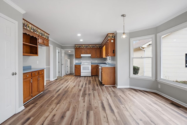 kitchen with pendant lighting, electric stove, sink, light hardwood / wood-style flooring, and ornamental molding