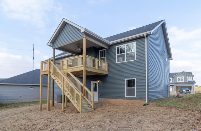 back of property featuring ceiling fan and cooling unit