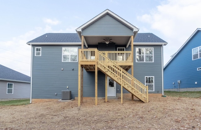 back of house with a deck, ceiling fan, and cooling unit