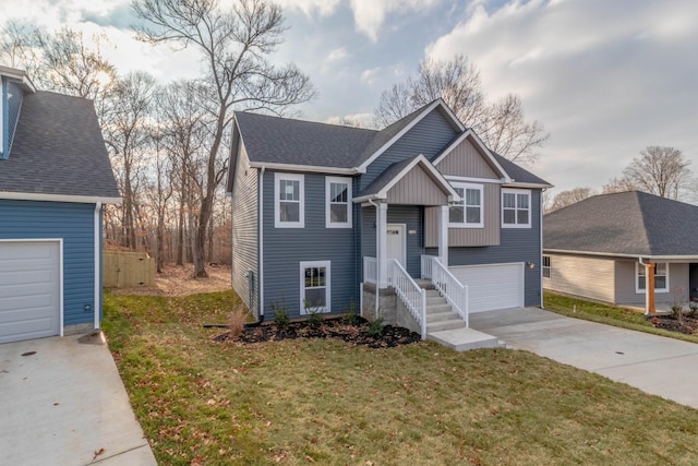 view of front of home featuring a garage and a front lawn