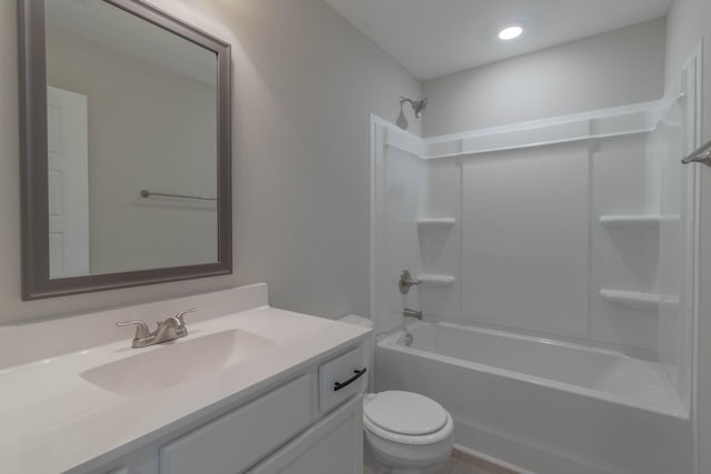 full bathroom featuring vanity, toilet, and bathtub / shower combination