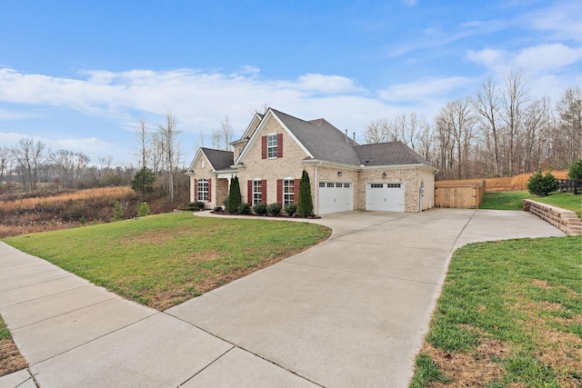 view of front facade featuring a front yard and a garage