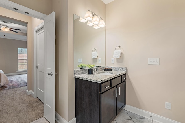 bathroom featuring tile patterned floors, ceiling fan, and vanity