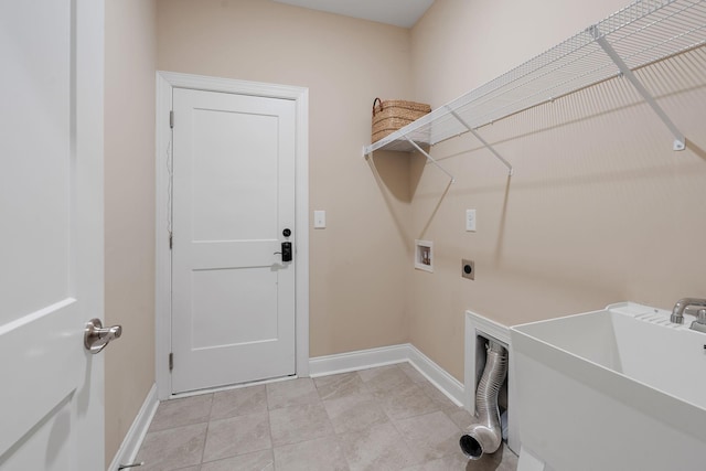 washroom with sink, washer hookup, and hookup for an electric dryer