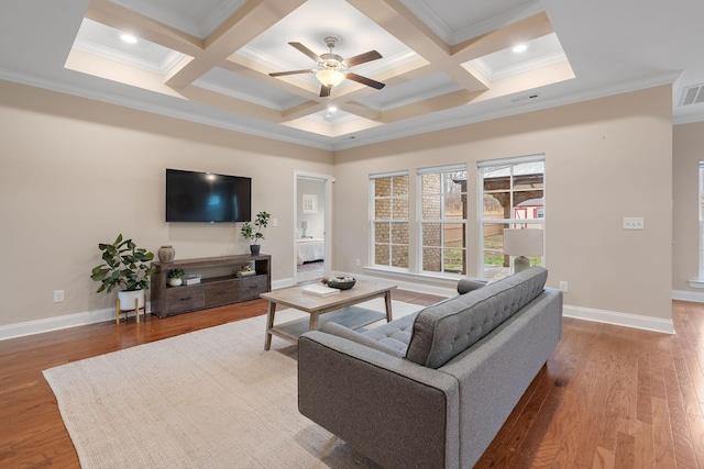 living room with ceiling fan, beam ceiling, crown molding, and coffered ceiling