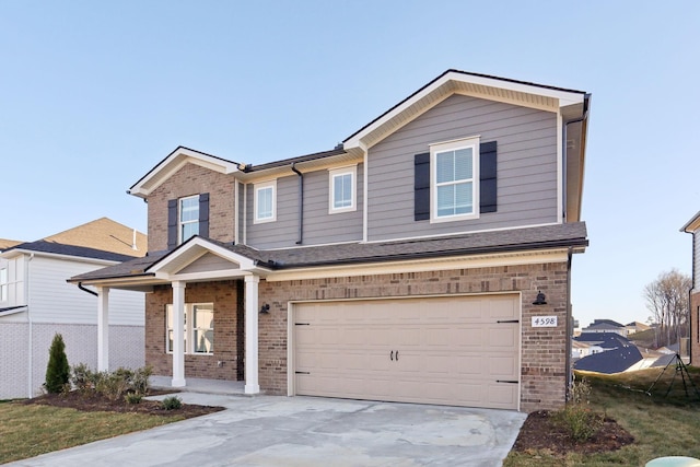 view of front of home featuring a garage, brick siding, driveway, and roof with shingles