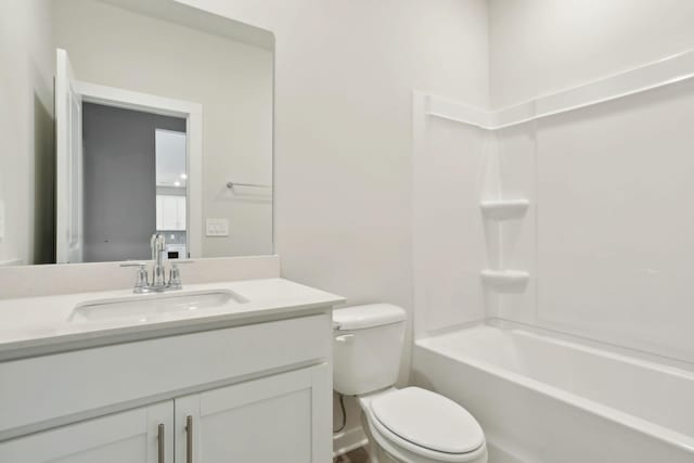 full bathroom with vanity, toilet, and shower / washtub combination