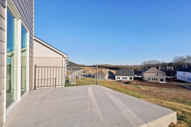 view of patio with a residential view