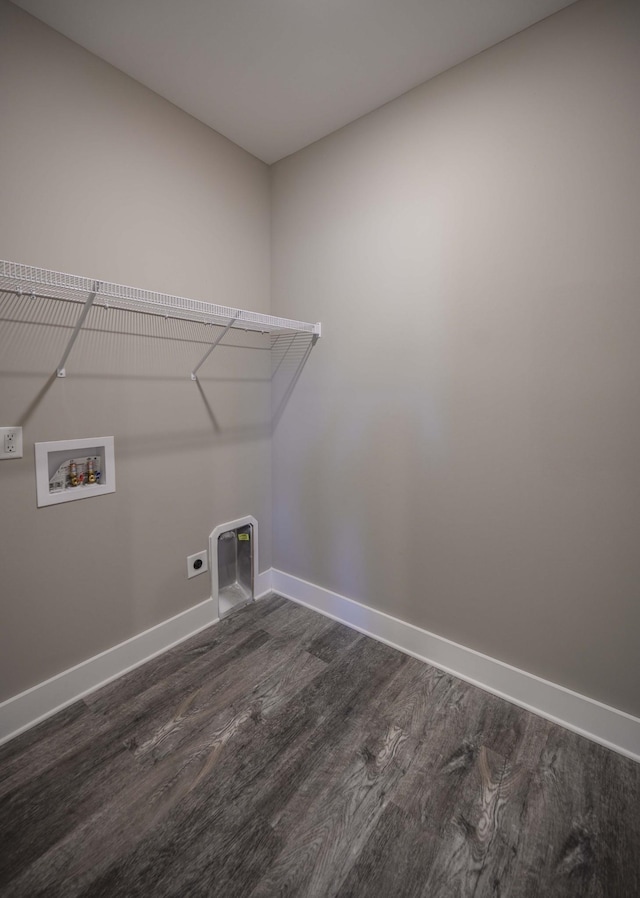 laundry room featuring hookup for an electric dryer, washer hookup, and dark hardwood / wood-style floors