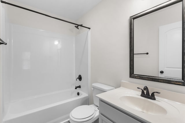 full bathroom with shower / bathing tub combination, vanity, and toilet