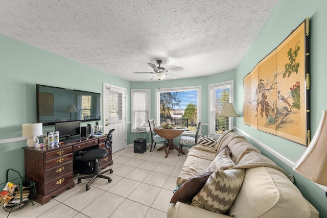 tiled office featuring ceiling fan