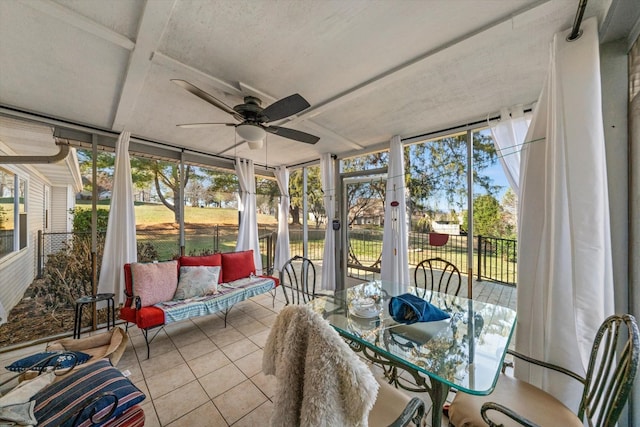 sunroom / solarium with ceiling fan