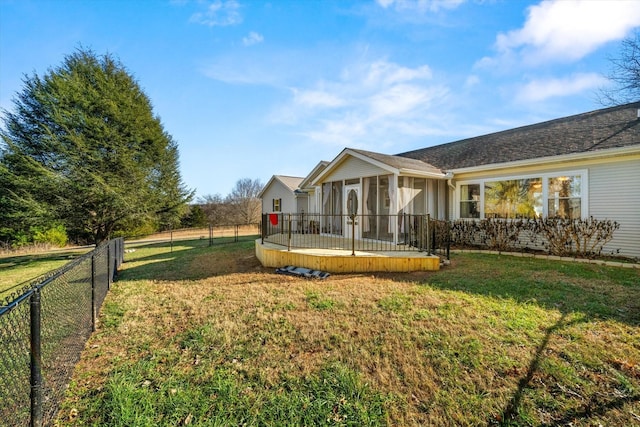 exterior space featuring a sunroom