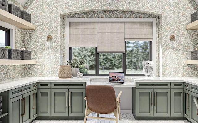 kitchen with green cabinets and light tile patterned floors