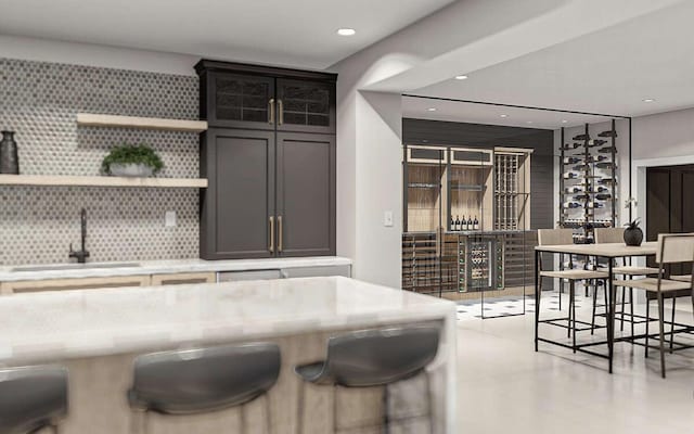 kitchen featuring decorative backsplash and sink