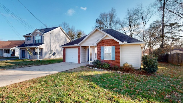 view of property featuring a front lawn and a garage