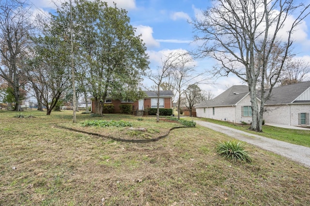 view of front of home with a front lawn