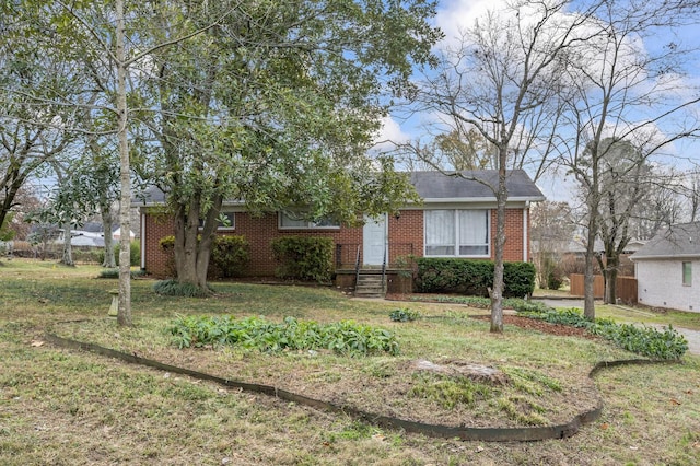 view of front facade featuring a front lawn