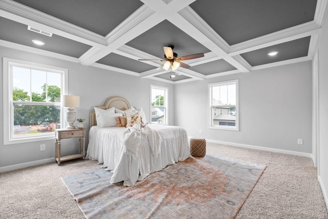 carpeted bedroom with ceiling fan, crown molding, and coffered ceiling