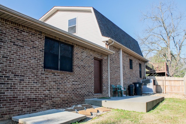 back of house featuring a patio area