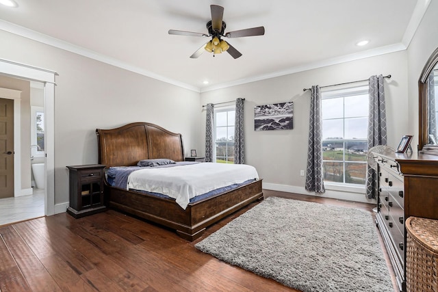 bedroom featuring ceiling fan, dark hardwood / wood-style floors, and ornamental molding