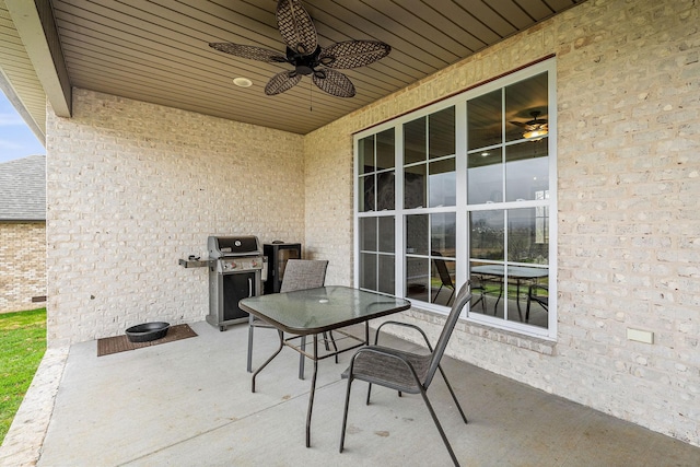 view of patio / terrace with grilling area and ceiling fan